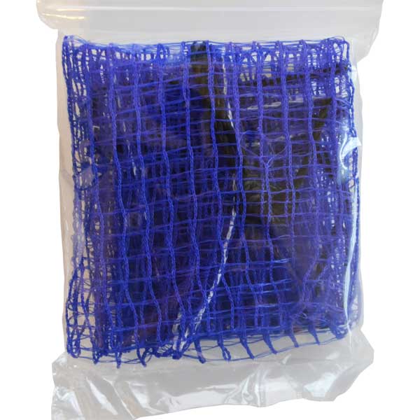 Blue mesh material with large holes in a clear plastic bag on a white background