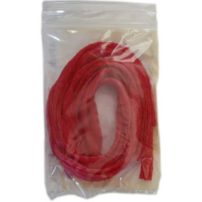 Red chum bags scrunched in a clear plastic bag on a white background