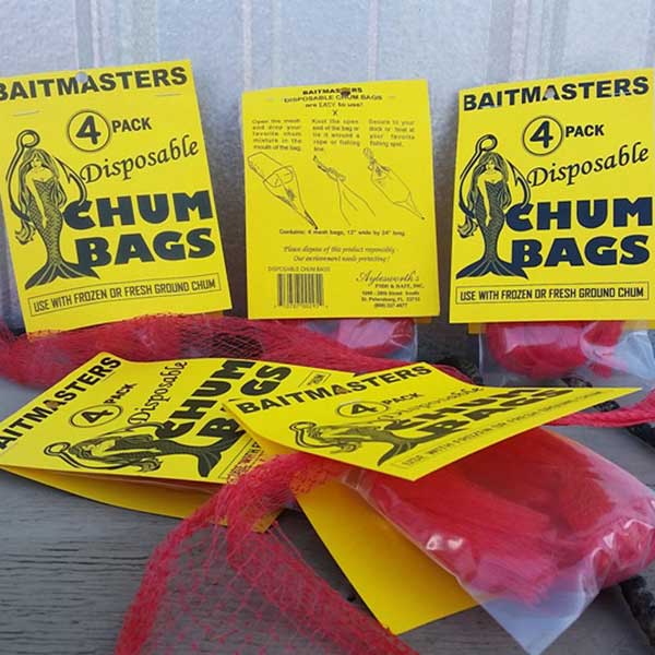 Baitmasters disposable chum bags packaging on a wooden surface