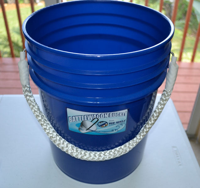 Blue bucket with a label on a white surface
