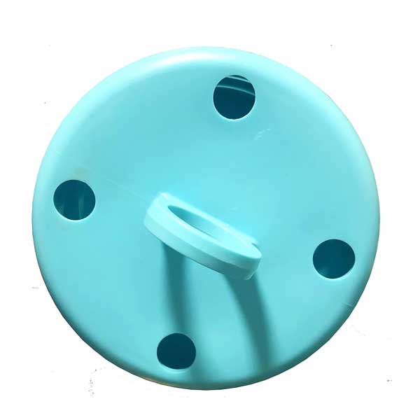 Turquoise plastic cap with a white ring on a white background
