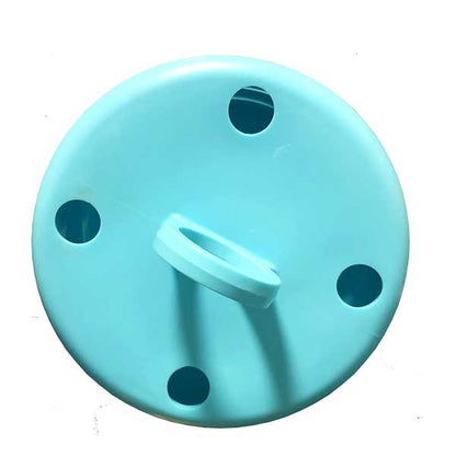 Turquoise plastic cap with a white ring on a white background