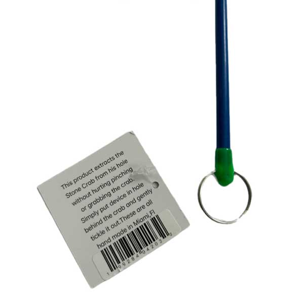 Product packaging with a label and a green and blue tool on a white background