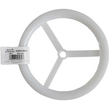 White plastic wheel for holding fishing line with a label on a white background