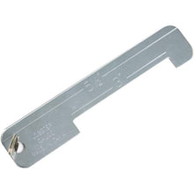 Gray metal caliper on a white background