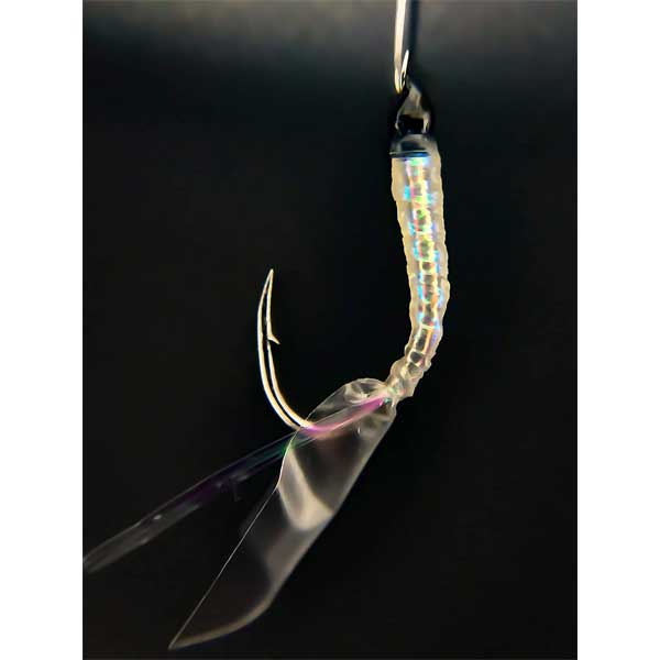 Fishing hook with a shiny, reflective lure on a dark background