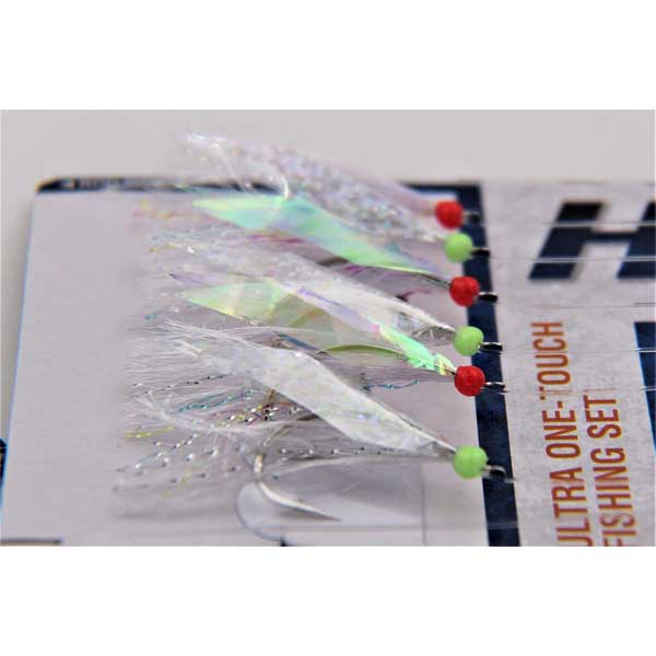 Fishing lures with red and green beads on a branded fishing tackle box background