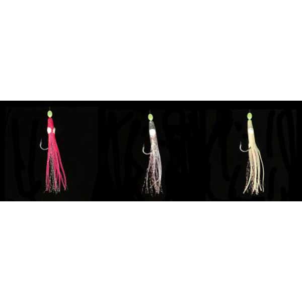 Three fishing lures in pink, white, and beige on a black background