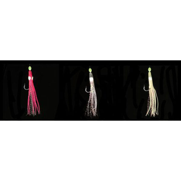 Three fishing lures in pink, white, and beige on a black background