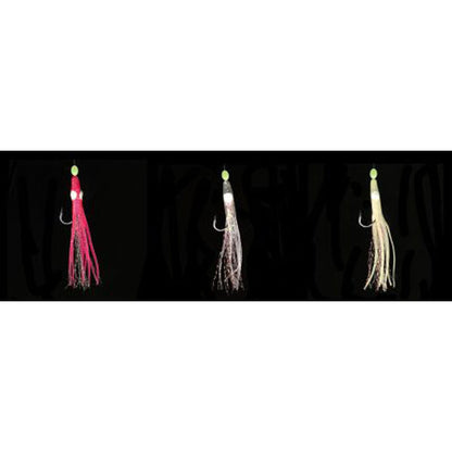 Three fishing lures in pink, white, and beige on a black background