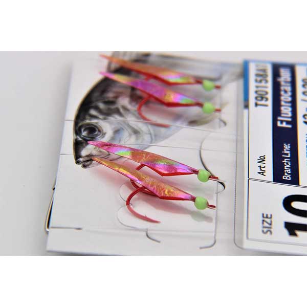 Fishing lure with colorful design on a card with brand information.