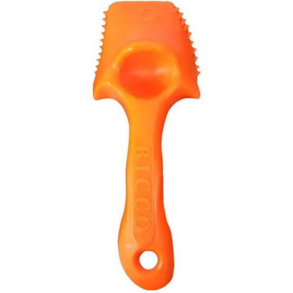 Orange plastic fish scale scraper tool with textured surface on a white background