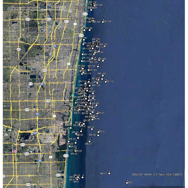 Map of a coastal area with streets and buildings, showing a close-up of a beach and waterfront properties.